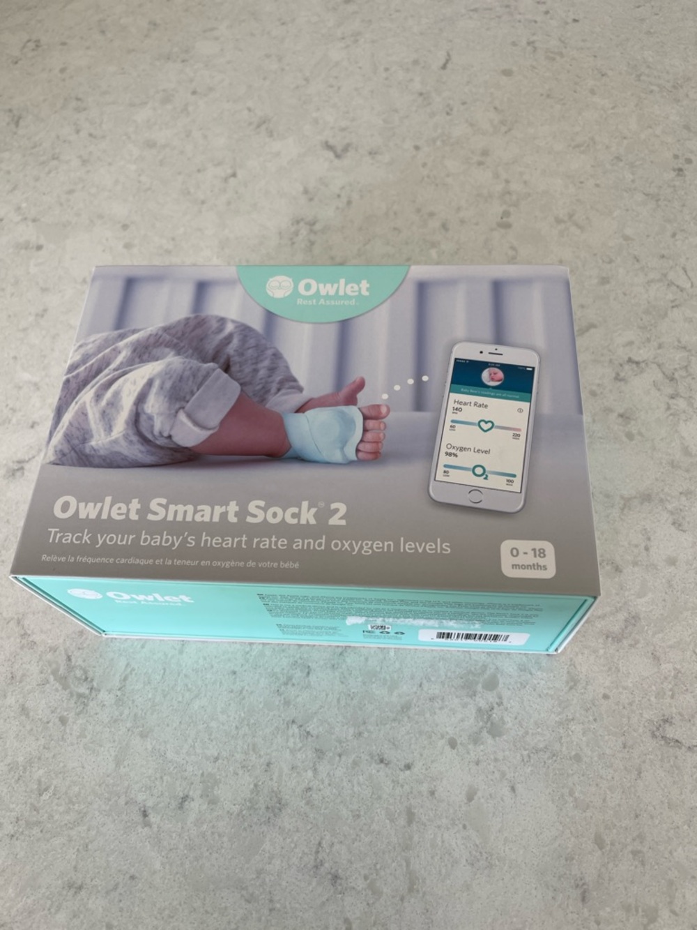 Owlet Smart Sock Baby Monitor in Mint and Light Gray